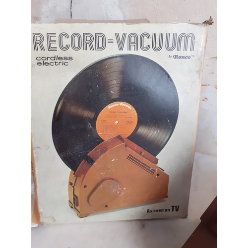 76 - VINTAGE CORDLESS RECORD VACCUMN STILL IN BOX