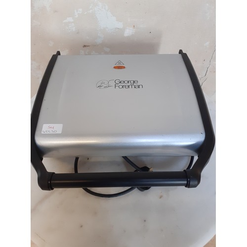 89 - NEW GEORGE FOREMAN GRILL