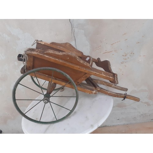 84 - A VINTAGE HANDMADE MODEL CART WITH METAL WHEELS