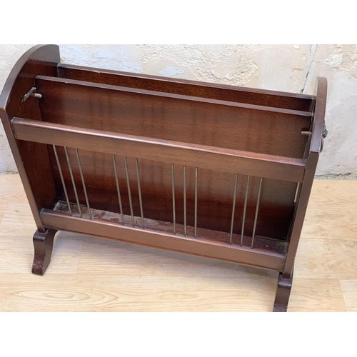 119 - A MAHOGANY MAG RACK