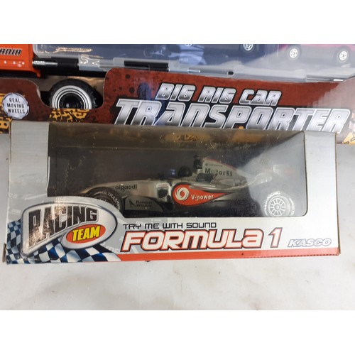 132 - BOXED CAR TRANSPORTER & BOXED F1 CAR