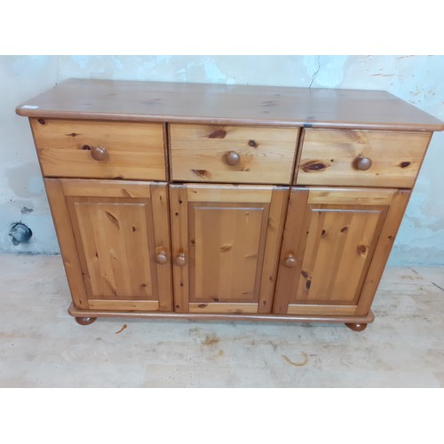 136 - A 3 DRAWERED 3 DOOR SIDEBOARD