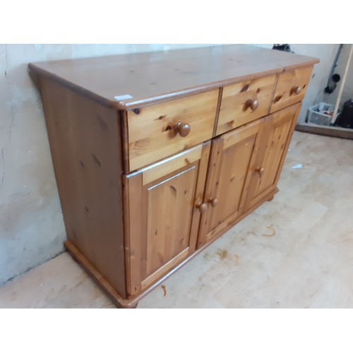 136 - A 3 DRAWERED 3 DOOR SIDEBOARD