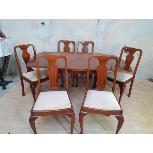 139 - A DRAWLEAF TABLE WITH 6 CHAIRS