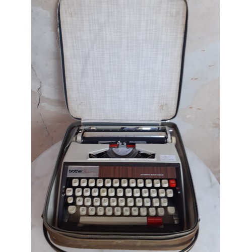 154 - VINTAGE BROTHER DELUXE 1350 TYPEWRITER IN ORIGINAL CASE