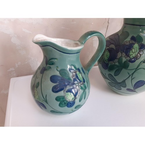 176 - A HAND PAINTED JUG AND VASE