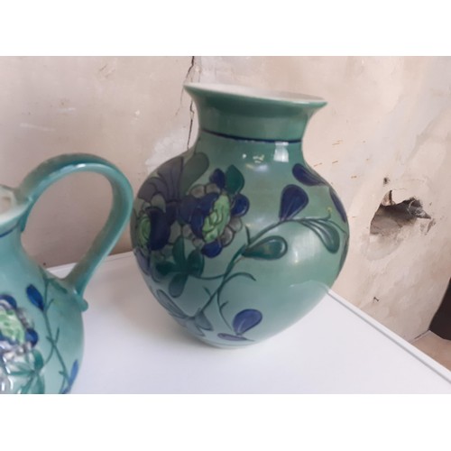 176 - A HAND PAINTED JUG AND VASE