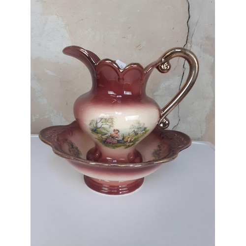 182 - A SMALL JUG AND BOWL