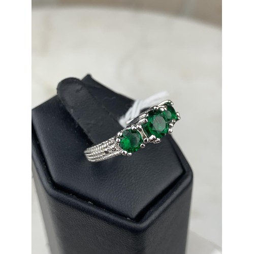 243 - SILVER RING SET WITH 3 GREEN STONES