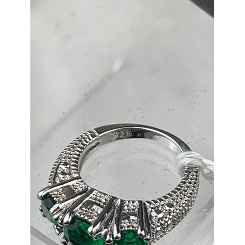 243 - SILVER RING SET WITH 3 GREEN STONES