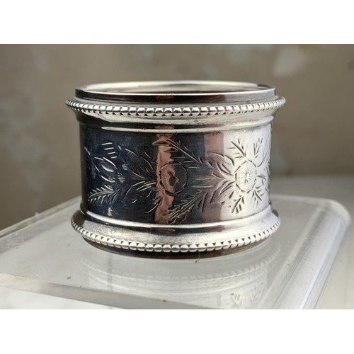 254 - AN EMBOSSED  BIRMINGHAM SILVER NAPKIN RING 17.4grms