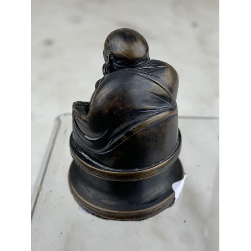 258 - A MINIATURE BRONZE BUDDHA