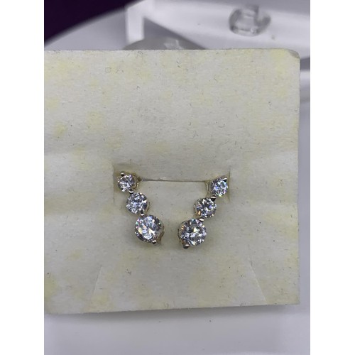 219 - A PAIR OF SILVER 3 DROP EARRINGS