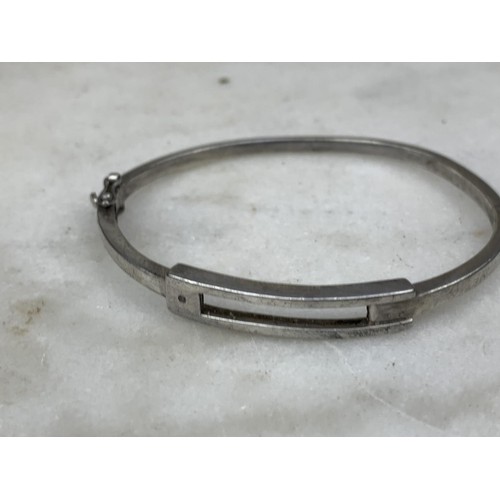 221 - SILVER BANGLE SET WITH A DIAMOND