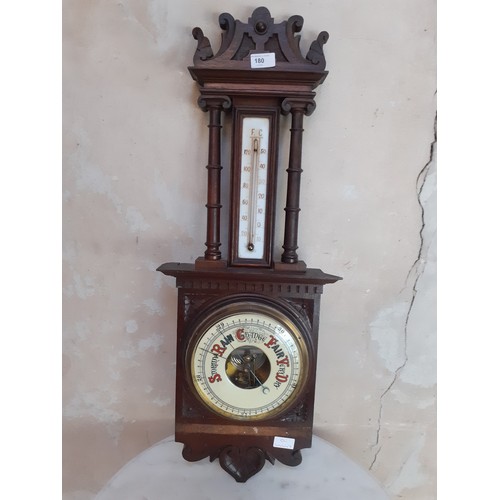 190 - AN ORNATE CARVED BAROMETER