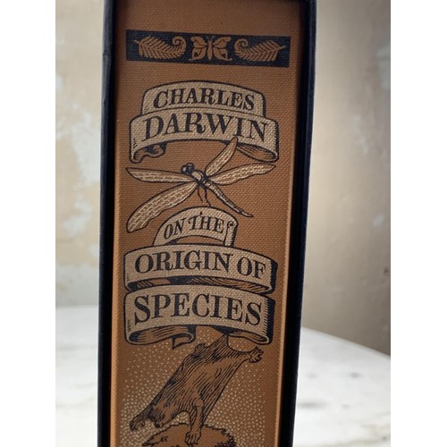 297 - AN ILLISTRATED CHARLES DARWIN ON THE ORIGIN SPECIES BOOK IN SLEEVE