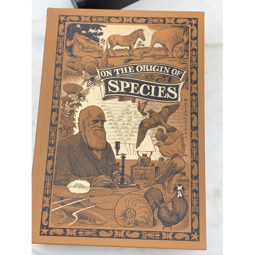 297 - AN ILLISTRATED CHARLES DARWIN ON THE ORIGIN SPECIES BOOK IN SLEEVE