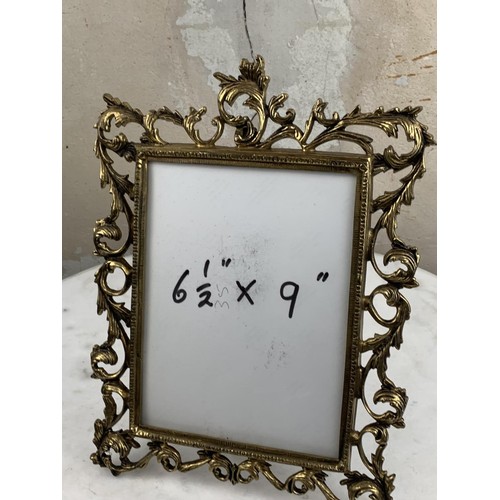 315 - A BRASS PHOTO FRAME TO SUIT 6.5X9