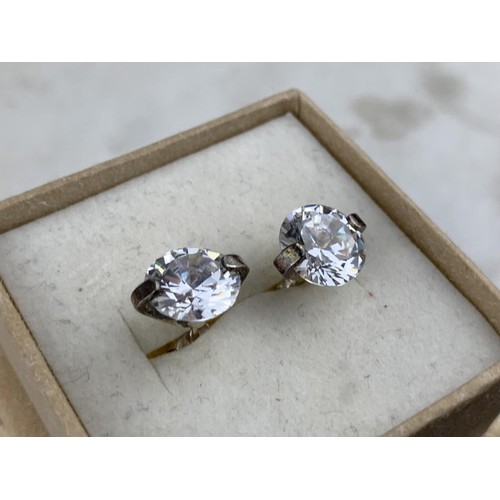 432 - A SILVER SET GEM SET SOLITAIRE EARRINGS