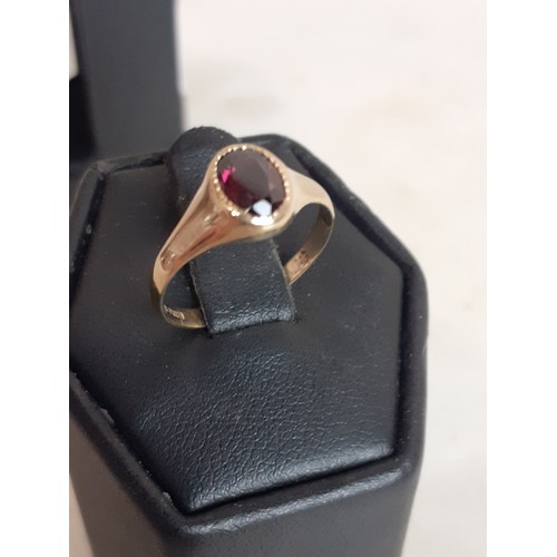 457 - 9ct GARNET RING 1.75gms