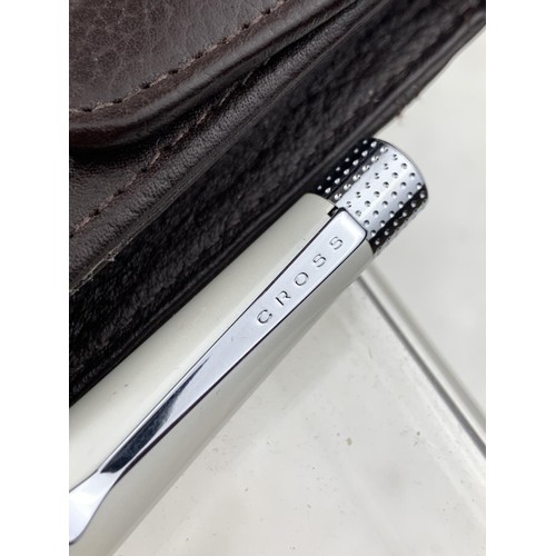 567 - A COLLECTABLE CROSS PEN IN LEATHER HOLDER