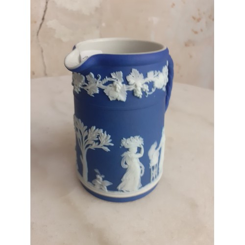 619 - A SMALL WEDGEWOOD JUG