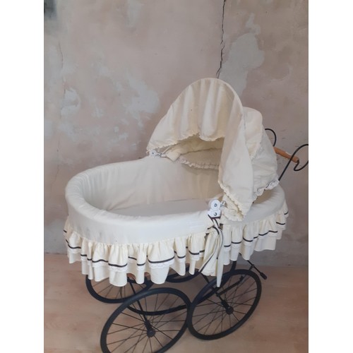 277 - A VINTAGE DOLLS PRAM