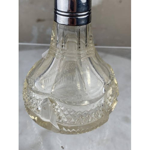 589 - SILVER TOPPED PERFUME BOTTLE 5.5