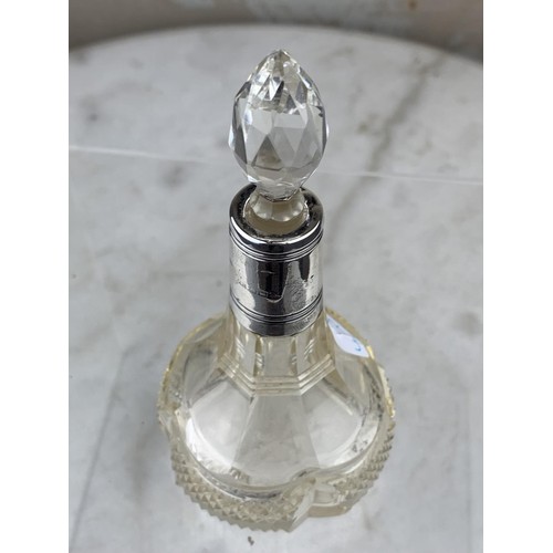 589 - SILVER TOPPED PERFUME BOTTLE 5.5