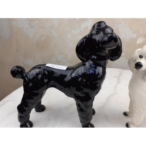 629 - 2 POODLE ORNAMENTS