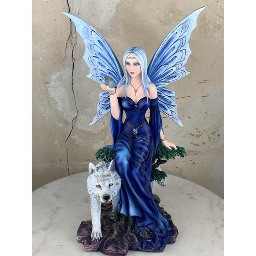 493 - A LARGE MYSTIC FAIRY & WOLF FIGURINE