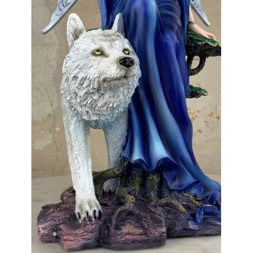 493 - A LARGE MYSTIC FAIRY & WOLF FIGURINE