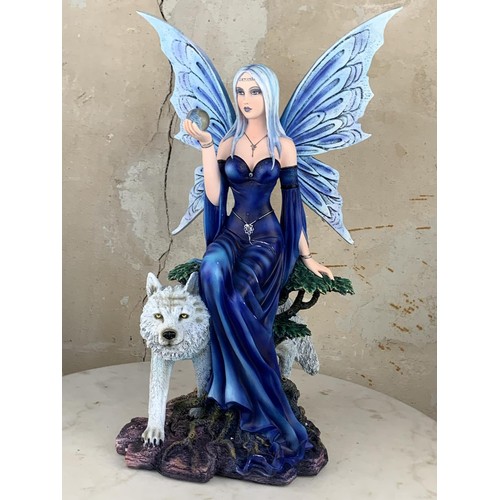 493 - A LARGE MYSTIC FAIRY & WOLF FIGURINE