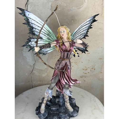 516 - A LARGE FAIRY WARRIOR FIGURINE