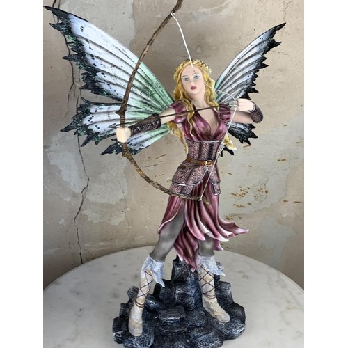 516 - A LARGE FAIRY WARRIOR FIGURINE