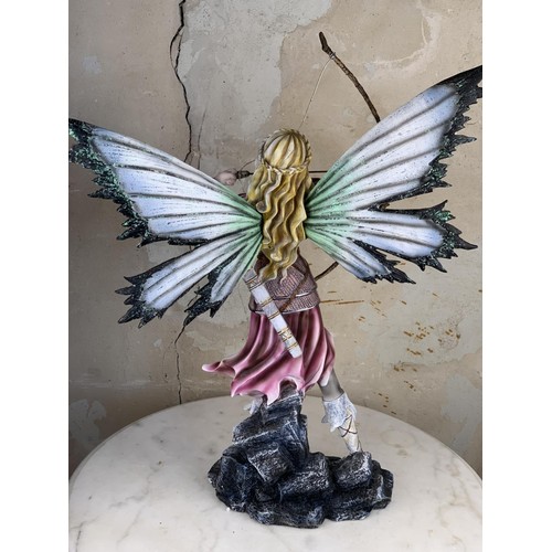 516 - A LARGE FAIRY WARRIOR FIGURINE