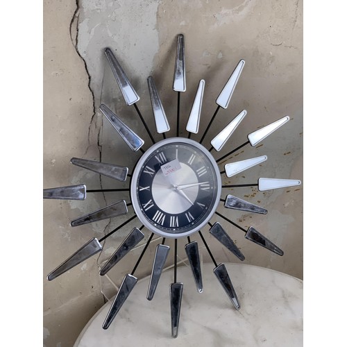 17 - A MODERN STARBURST CLOCK 22