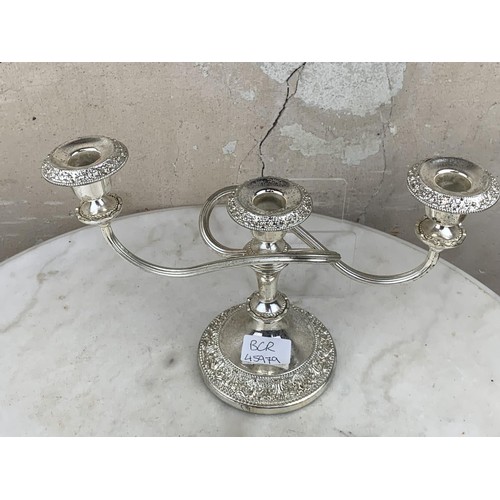 22 - A PAIR OF PLATED CANDLELABRA & A PAIR OF PLATED CANDLESTICKS