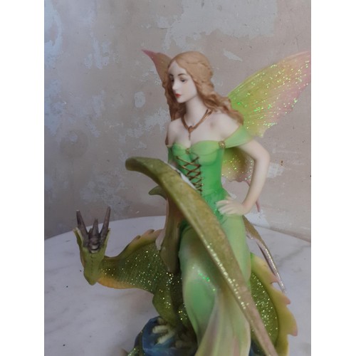 37 - A GREEN FAIRY AND DRAGON FIGURES 10