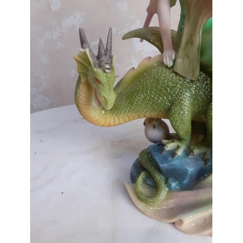 37 - A GREEN FAIRY AND DRAGON FIGURES 10