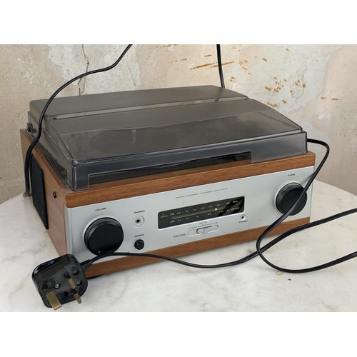 42 - A MODERN RECORD PLAYER