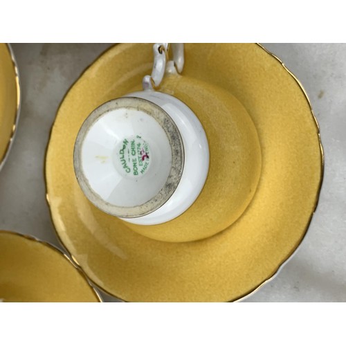 47 - 4 DUO CAULDRON BONE CHINA CUPS AND SAUCERS