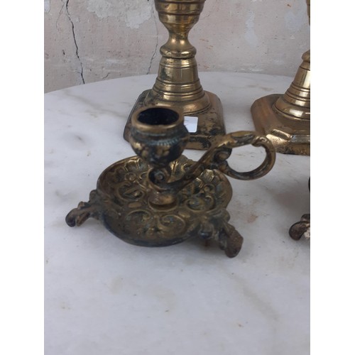 97 - A PAIR OF BRASS CANDLESTICKS AND FINGER SCONCE