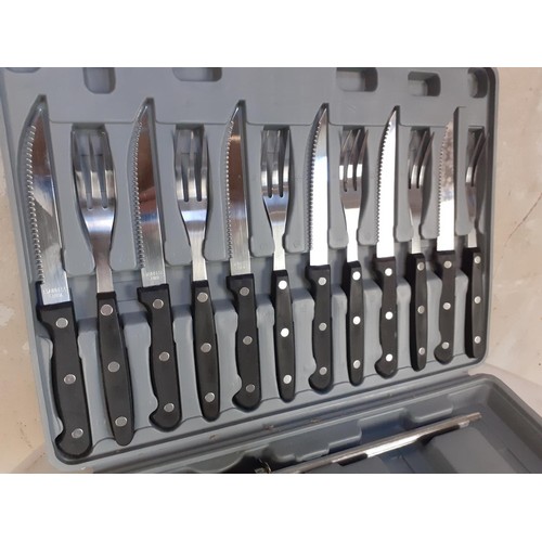 129 - A NEW CUTLERY SET