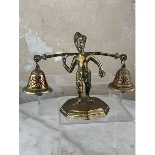 164 - A BRASS WATER CARRIER BELL SET 4