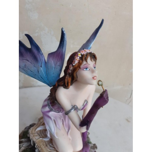 171 - A BUBBLE BLOWING FAIRY FIGURE 9