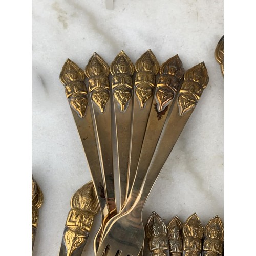 174 - 40 PIECE STAR OF SIAM BRASS CUTLERY WITH BUDHHA HANDLES