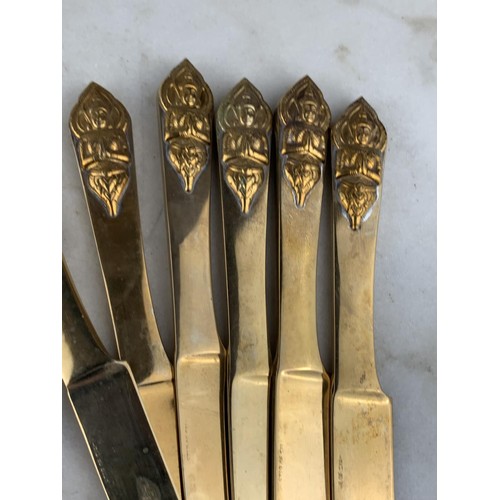 174 - 40 PIECE STAR OF SIAM BRASS CUTLERY WITH BUDHHA HANDLES