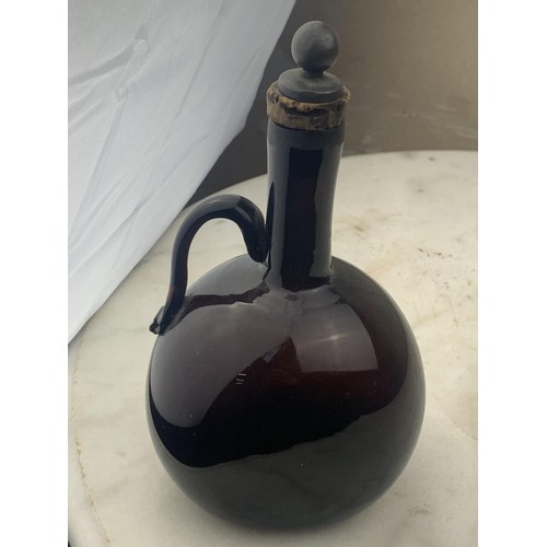 152 - AN UNUSUAL PURPLE DECANTER