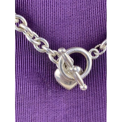 211 - A HEAVY SILVER CHAIN WITH HEART PEANDANT & T BAR 31.3g